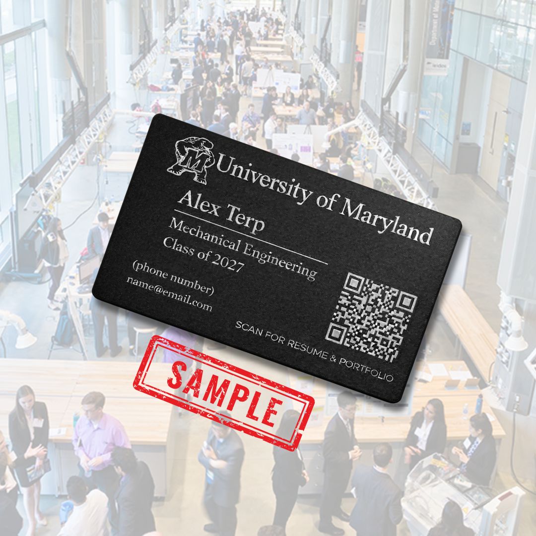 Student holding their custom metal card