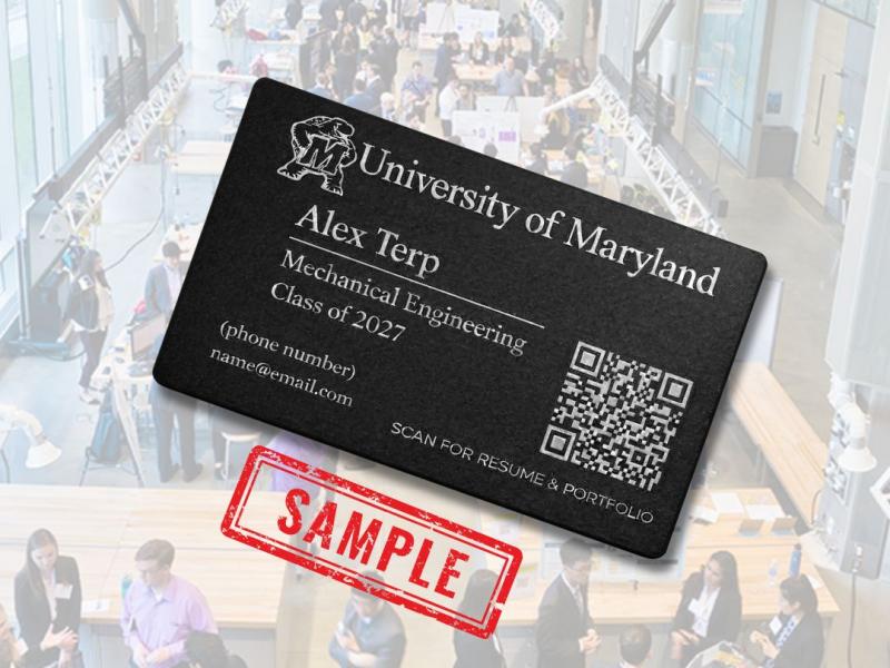 Student holding their custom metal card